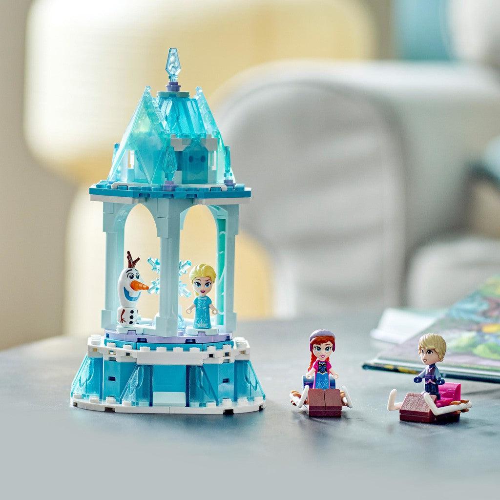 image showss the completed Carousel with Elsa and Olaf inside while anna and Christof sled around.