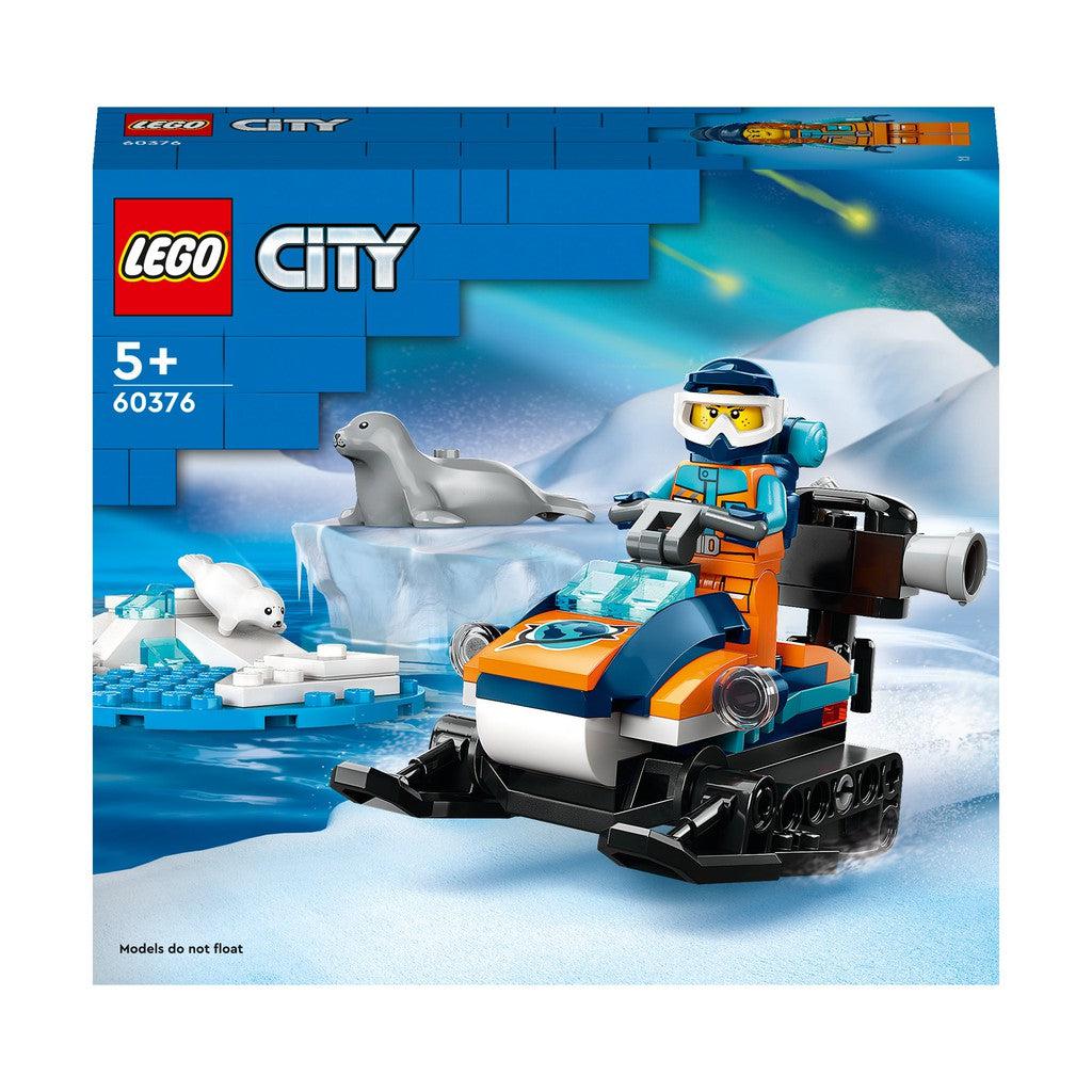 image shows teh box for the artic explorer. there is a lego man riding the machine with two seals on the side