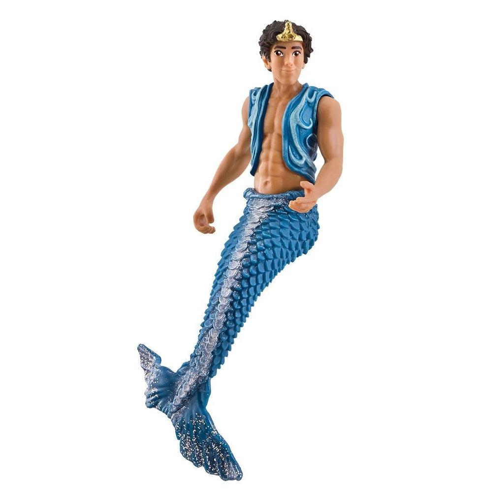 Close up of the merman figure. He is wearing a blue vest and has a blue glittery mermaid tail. He has a golden crown.