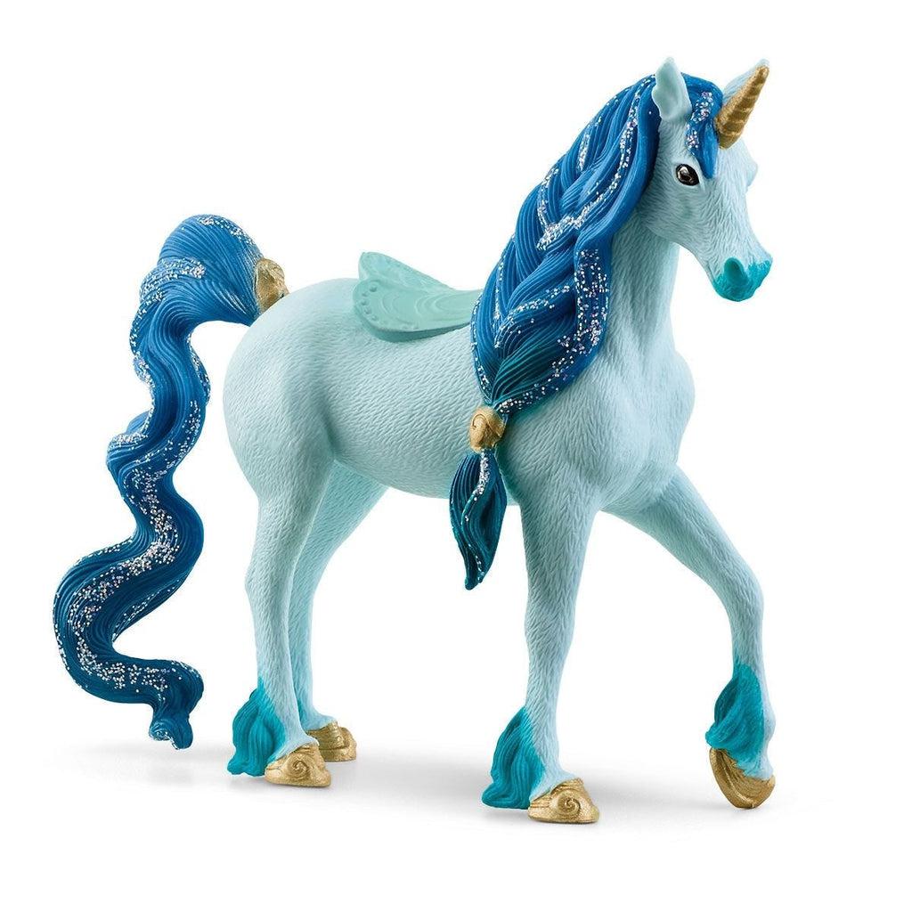 Close up of the unicorn. It is light blue with darker blue glittery hair. It has a golden horn and golden hooves.