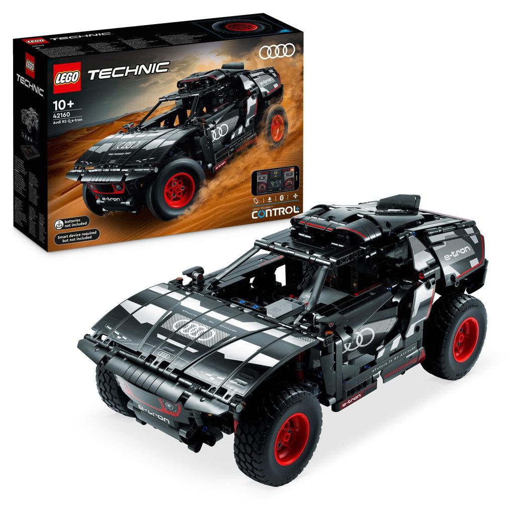 image shows the LEGO technic vehicle. Image shows a black car on the box and in front of the box with big wheels