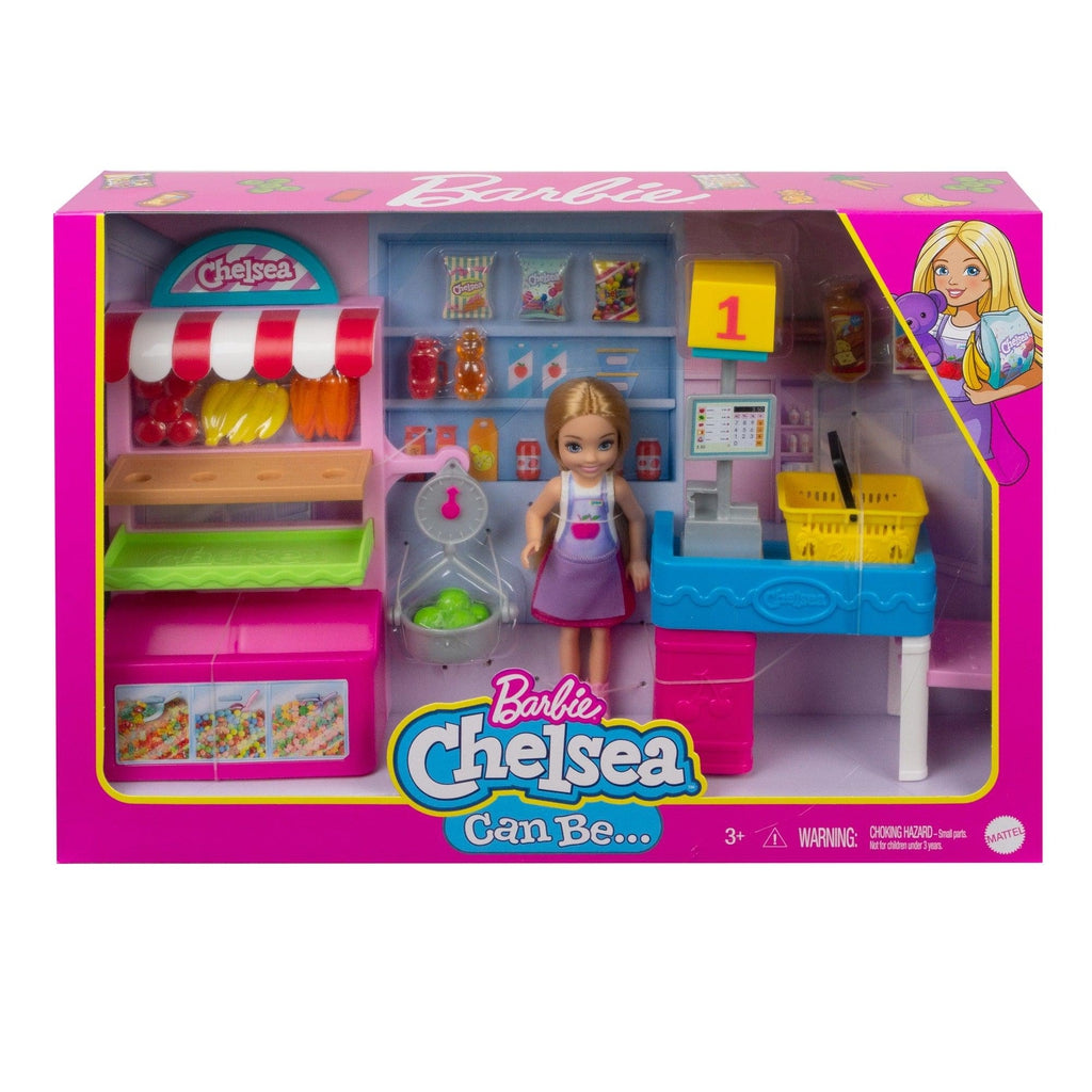 Image of the packaging for the Barbie - Chelsea Can Be Snack Stand Playset. The front is made from clear plastic so you can see all the included pieces inside.