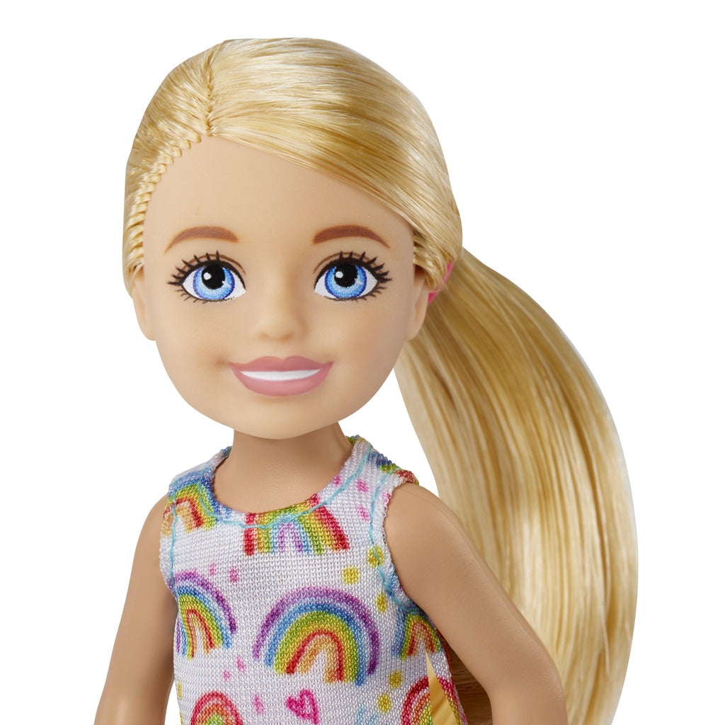 Close up shot of Chelsea's face. She has straight blonde hair and blue eyes just like her sister Barbie.