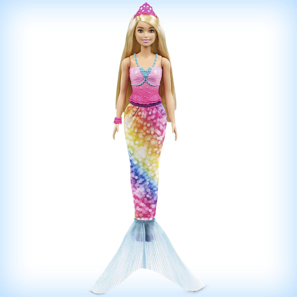 Shows Barbie in her mermaid form. She has a pink bodice and her tail is rainbow and has a sparkle texture.