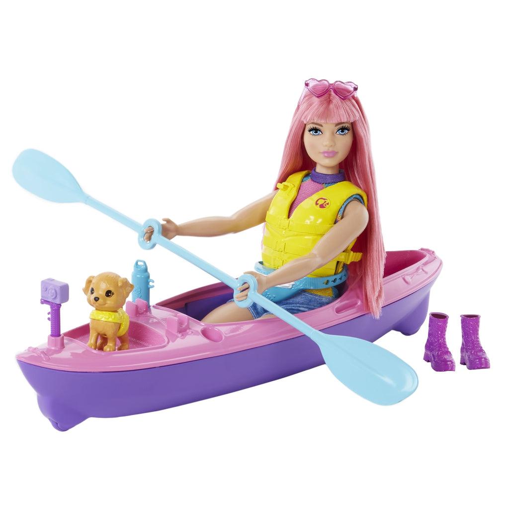 Shows Daisy in the kayak with everything in the set put together.