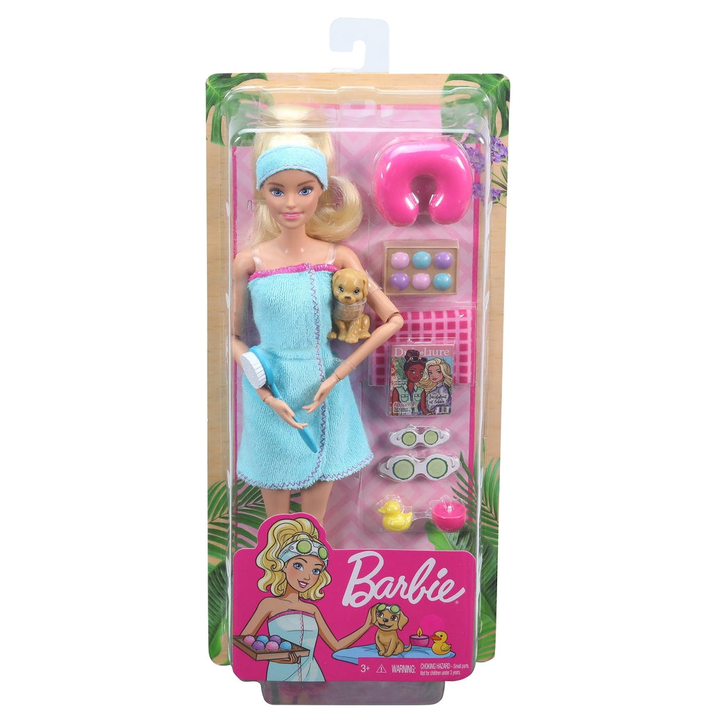 Image of the packaging for Barbie Spa Doll. The front is made from clear plastic so you can see all the included pieces inside.