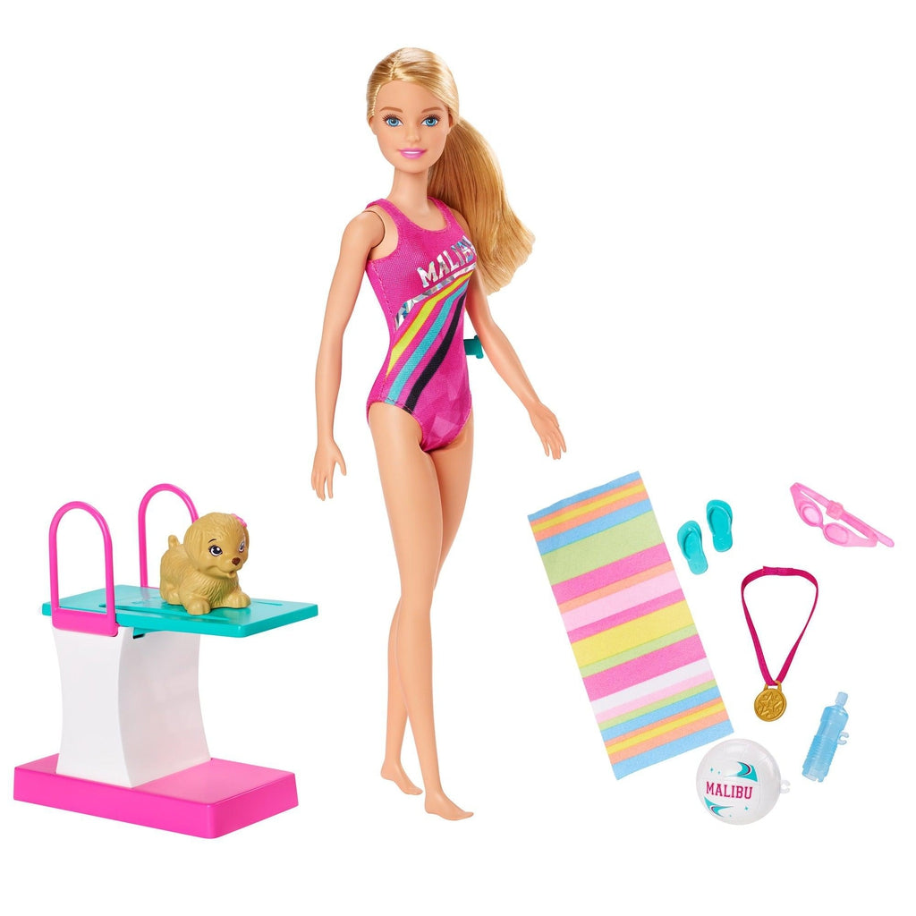 Image of all the included pieces outside of the packaging. The set includes Barbie in a swimsuit, a diving board, a towel, a dog, and some swimming gear.