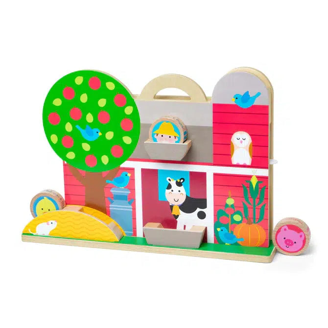 Image of the back of the toy.  It has pictures of different farm animals all over. It has many places for the farmer and animal character disks to rest for storage.