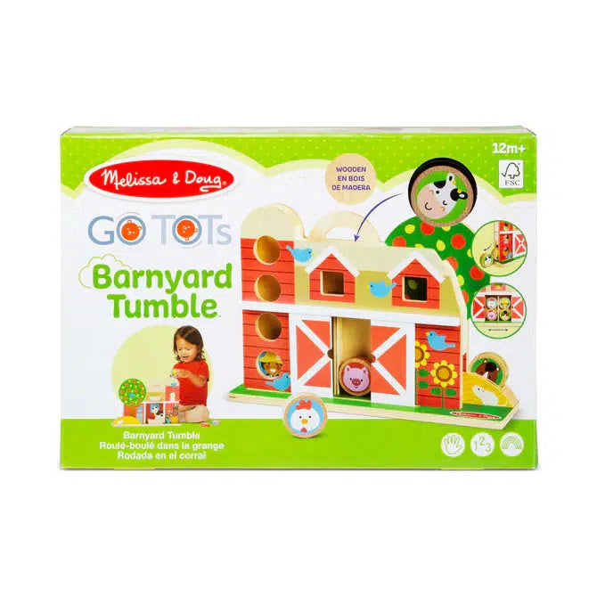 Image of the packaging for the Barnyard Tumble GO TOTS toy. On the front is a picture of the toy and another picture of a little kid playing with the toy.