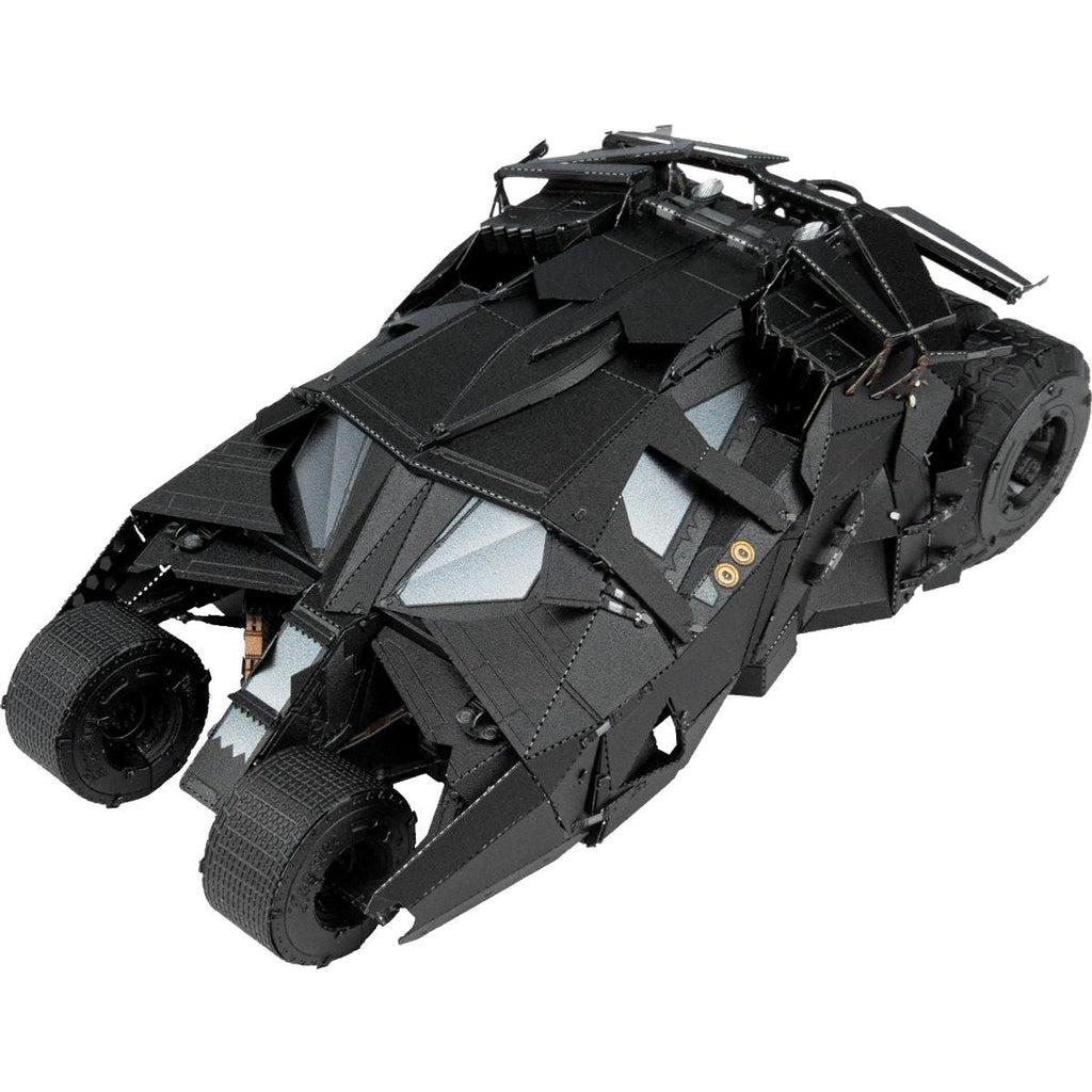 Image of the Batman Tumbler model. It is mainly made from black painted metal. The car has many detailed layers with two wheels on the front and a wheel on each side.