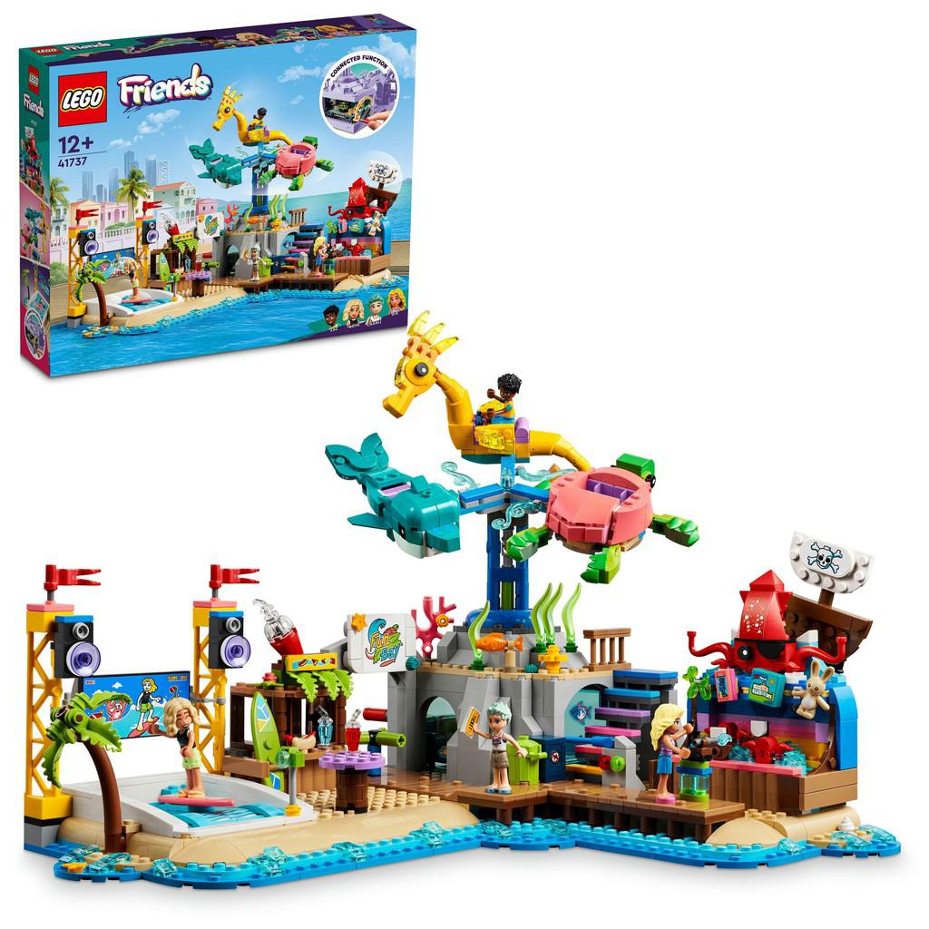 image shows the LEGO Friends set of a beach amusement park. there is a ride shaped like a dolphin, sea horse and turtle, as well as many attractions to visit with games to play