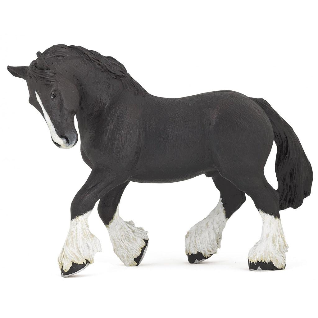 Image of the Black Shire Horse figurine. It is a black horse with furry white legs and a white stripe on his nose.