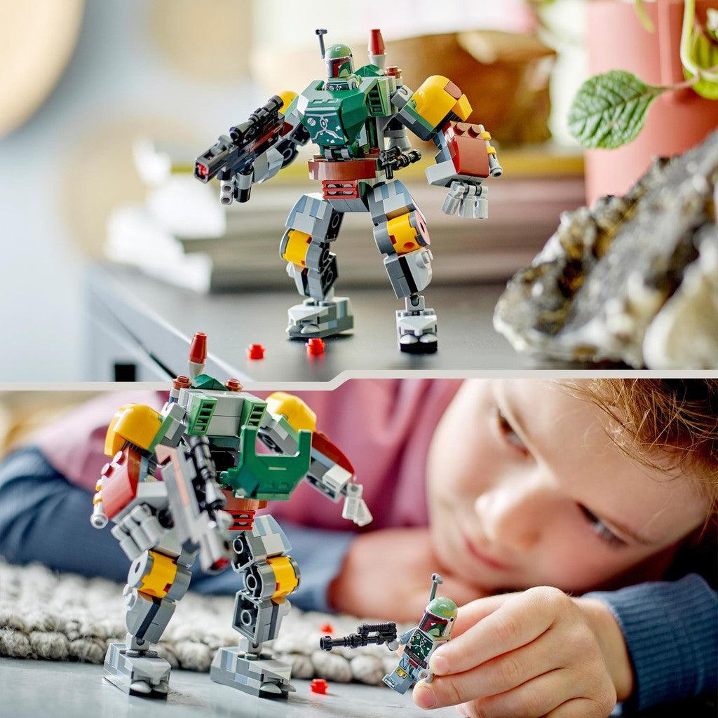 image shows a constructed Boba Fett mech on a table and a kid playing with the mech