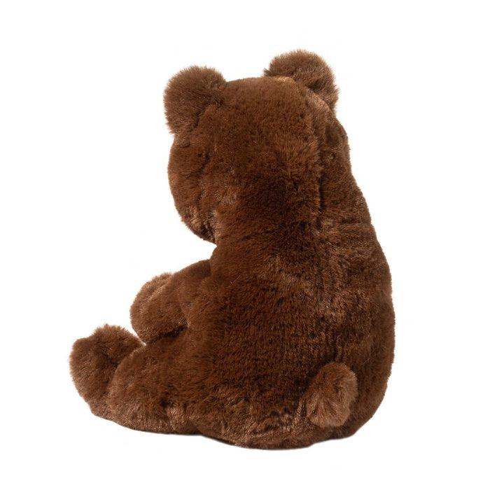 the back of the bear shows soft dark brown fur, a small tail and the stitching lines on the stuffed animal