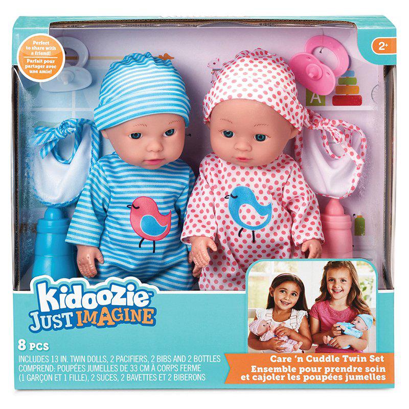 The packaging for the twin dolls, shows one in blue and one pink with matching bibs, pacifiers and bottles.
