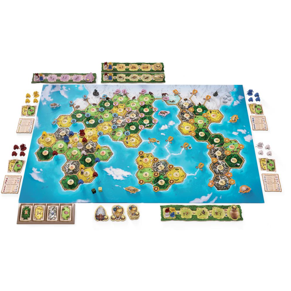 Image of the fully put-together game board. It is larger than regular Catan game boards. It is a map of the world with hexagonal tiles creating the shape of the continents. 
