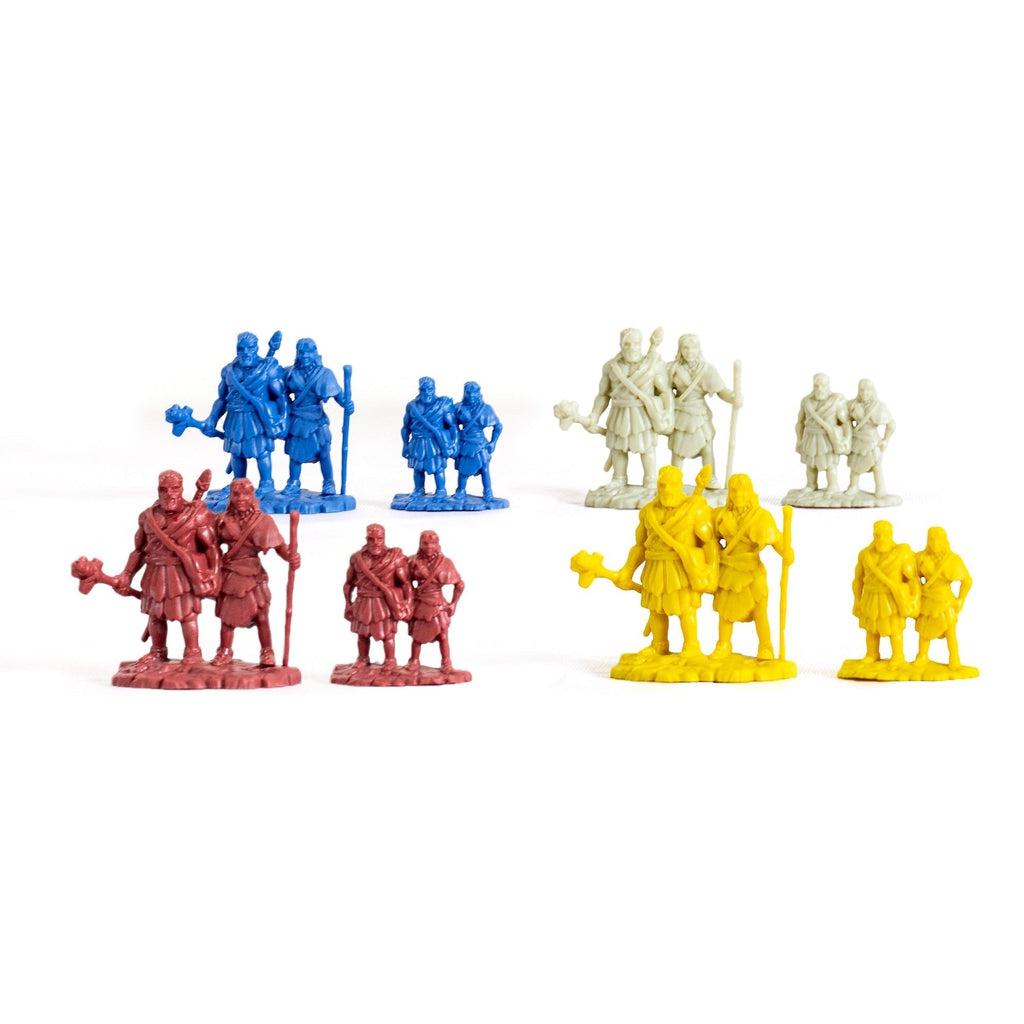 Close up of the different Risk-like colored figures. They come in blue, white, red, and yellow, and they are of two people side to side holding weapons.