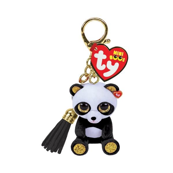 Image of the Chi the Panda Keychain. It is a hard panda figurine with golden ears, eyes, and paws. It is attached to a gold colored keychain clip.