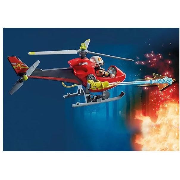 This picture shows a playmo fire fighter flying the helicopter and saving the day by putting out a fire with the jet stream of water. 