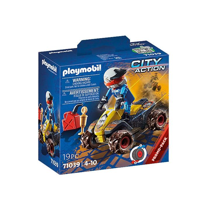 The racer quad set shows a box with a racer standing up on his racer, his helmet securely on tight. there is a can of gas next to him and a trophy,