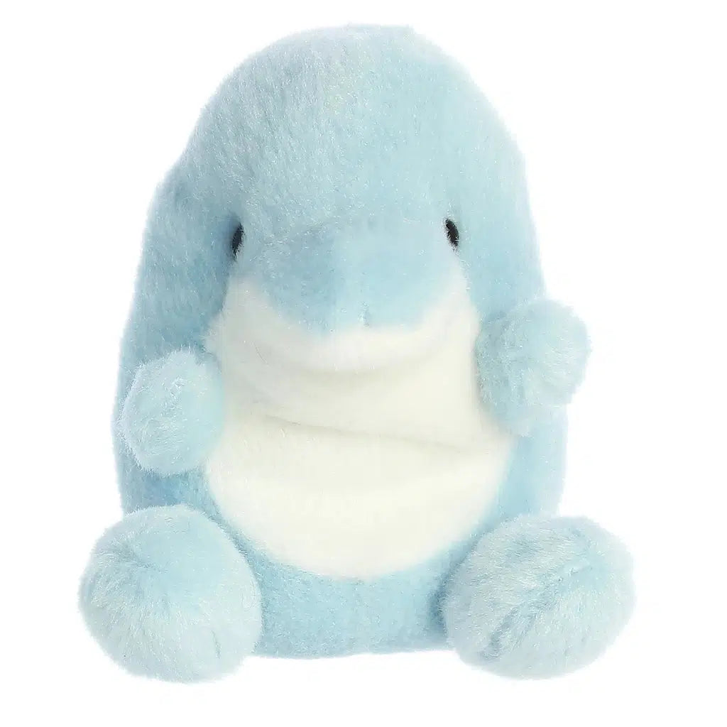 Image of the Clicks Dolphin plush. The dolphin is a light blue with a white belly. Its arms are out as if asking for a hug.