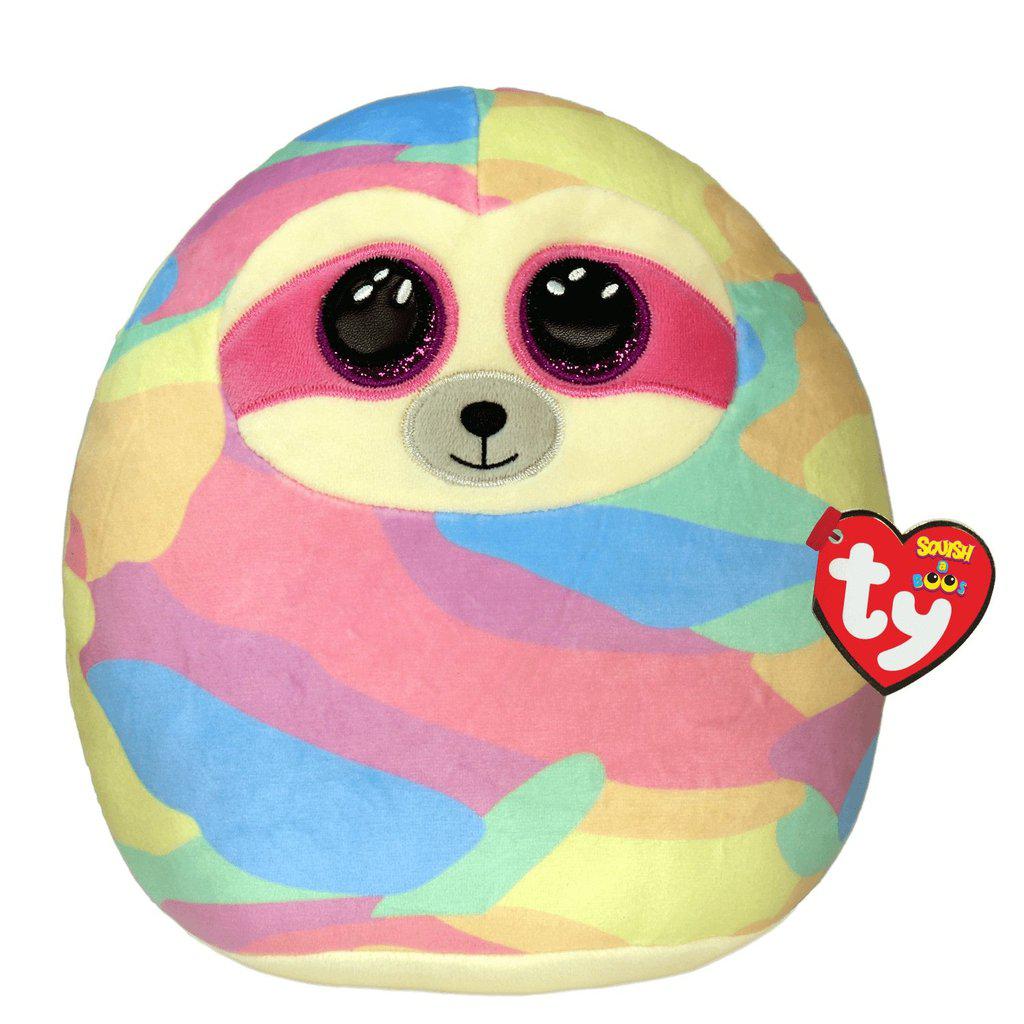 Image of the Cooper the Sloth Squish-A-Boo plush. It is a rainbow camouflage sloth with glittery purple eyes. 
