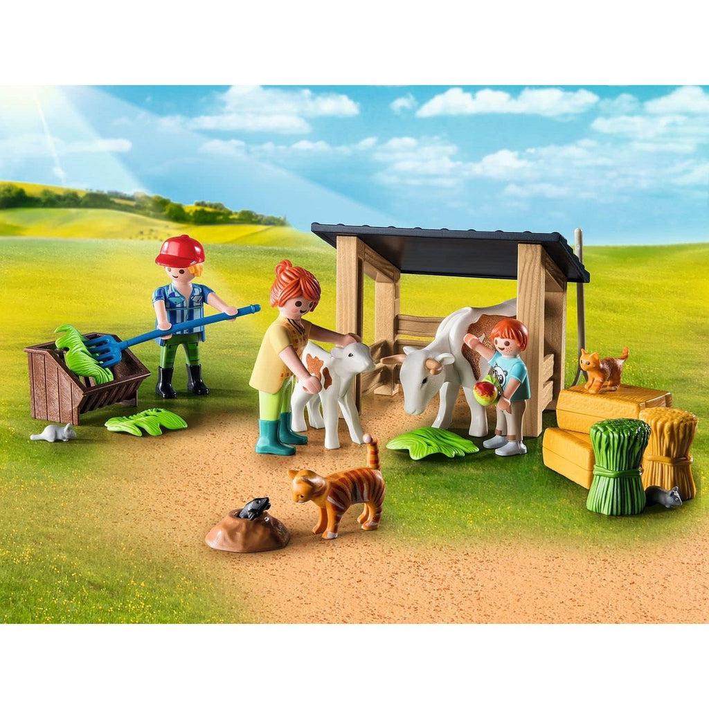 this picture shows the childing petting the cow, while other family members work. a cat is looking ar a mouse in a hole.