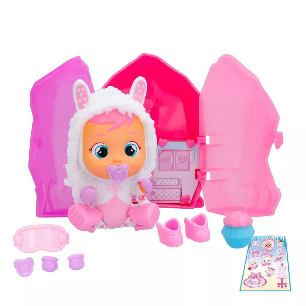 Shows all the included pieces once the box is opened. Each one includes a cry baby with an outfit, two shoes, a sleeping mask, a pacifier, two mittens, a sticker sheet, and an extra pieces specialized per different cry baby.
