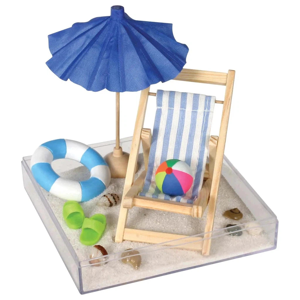the life in miniaturre shows a accessories for a beach day built for decor or a zen garden