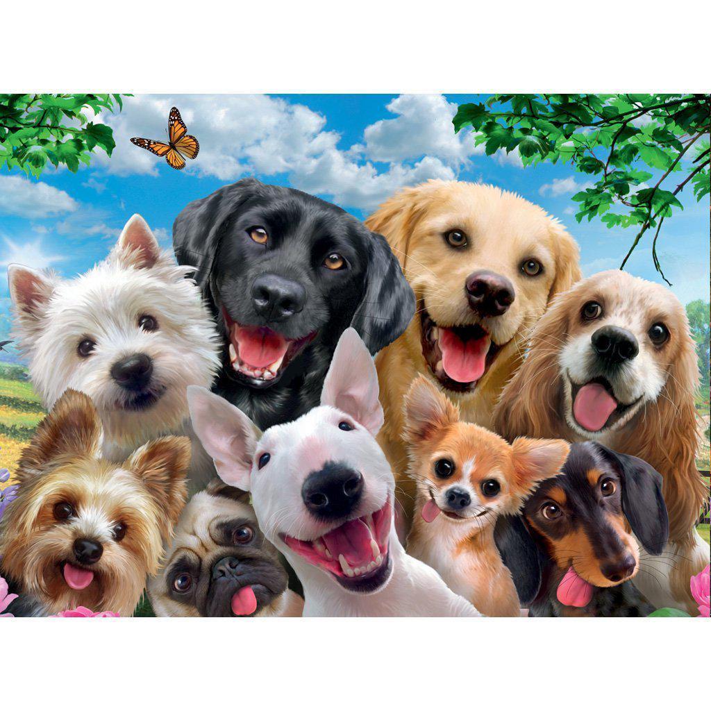 Image of the finished puzzle. The picture is a realistic photo of many different breeds of dogs all smiling and gathered together as if they were taking a selfie.