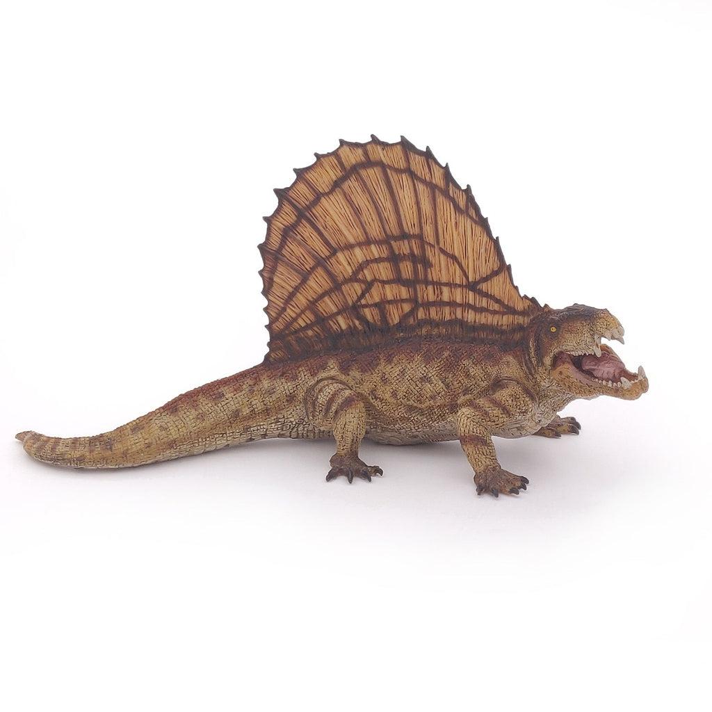 Image of the Dimetrodon figurine. It is a red and orange dinosaur. It is shaped like a crocodile and it has a very tall fin on its back.