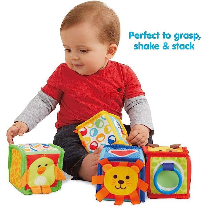 Scene of a baby playing with the block toys.