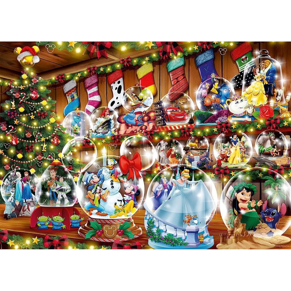 Image of the finished puzzle. It is a Christmas scene of a couple shelves of snow globes themed after different Disney movies.