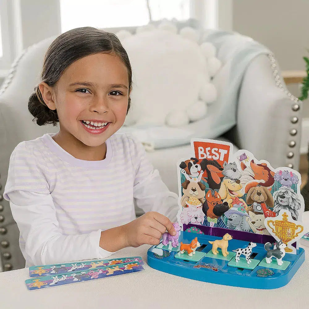 this image shows a girl sliding the dogs into a winning lineup based on a strip of paper to complete the puzzle game