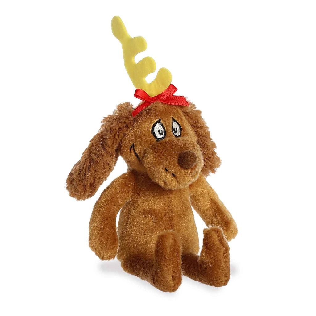 Image of the Dr. Seuss Max plush. It is a cartoonish brown fluffy dog with a yellow antler tied to his head with a red bow.