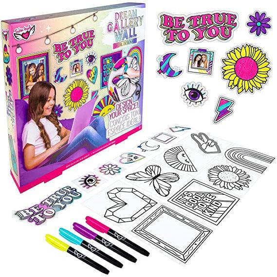 Image of all the included pieces of the craft kit. It includes different colorable/cutomizable stickers and four markers (yellow, blue, purple, and pink).