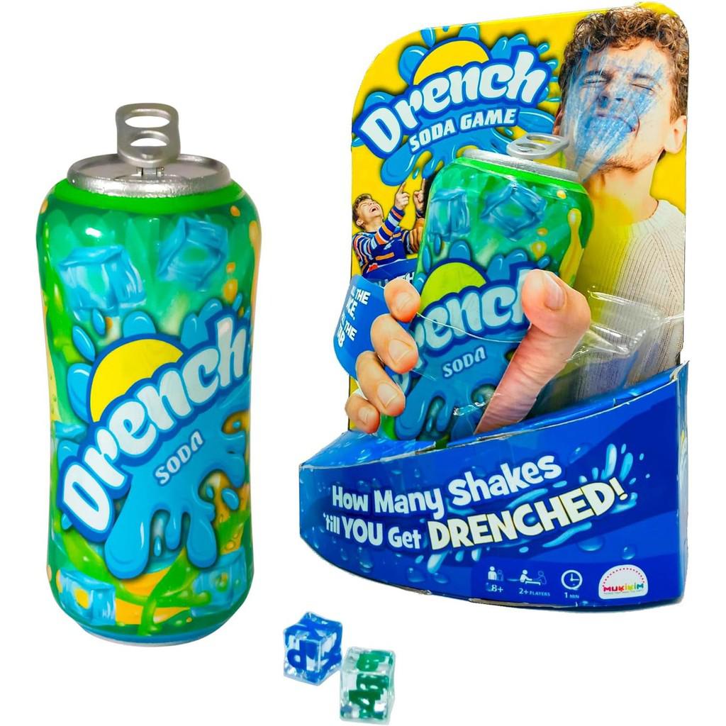 this image shows the play soda can that shoots water and the dice for how many shakes to give to a player. "how many shakes 'till you get DRENCHED" is written on the plastic container for the game