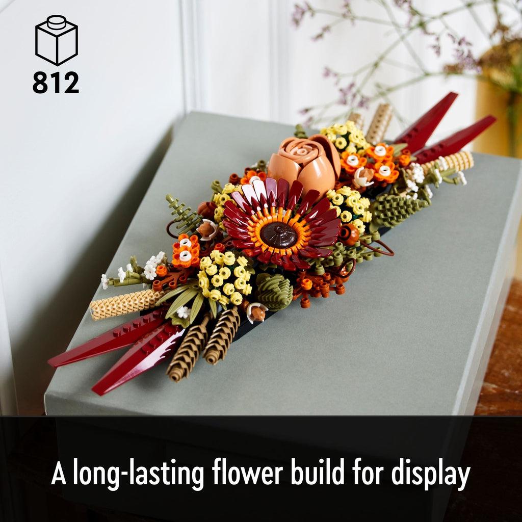 Image of the finished LEGO build on a table. Number of Pieces: 812 Caption: A long-lasting flower build for display
