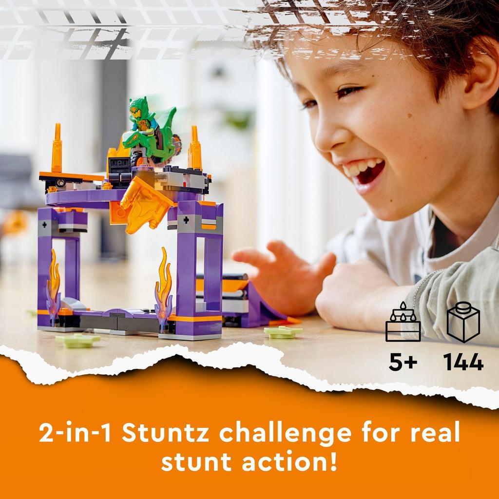 Scene of a little boy excitedly playing with the LEGO playset. Recommended Age: 5+ Number of Pieces: 144 Caption: 2-in-1 Stuntz challenge for real stunt action!