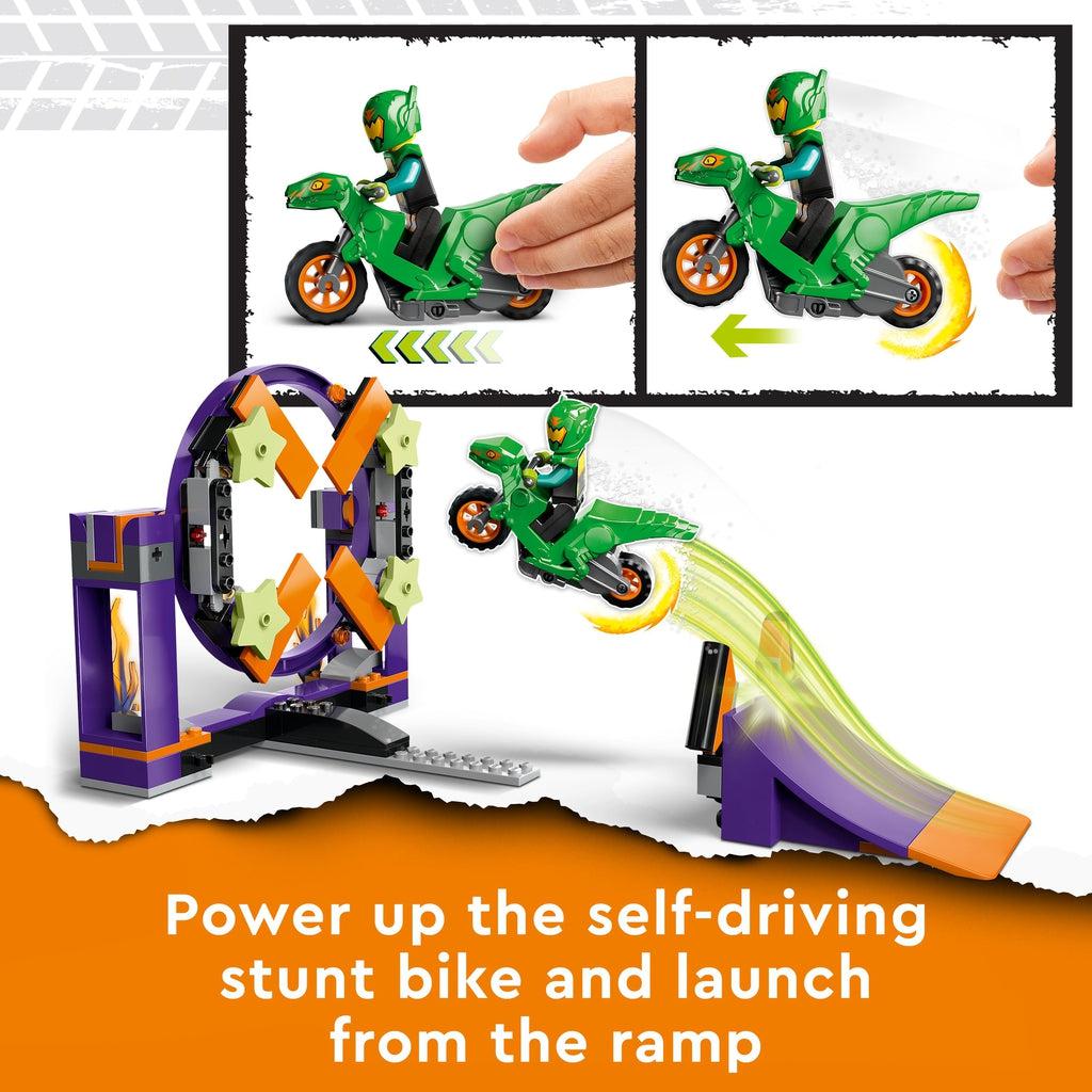 Close up of the included LEGO minibike. It can drive itself when you pull back and release. Caption: Power up the self-driving stunt bike and launch from the ramp