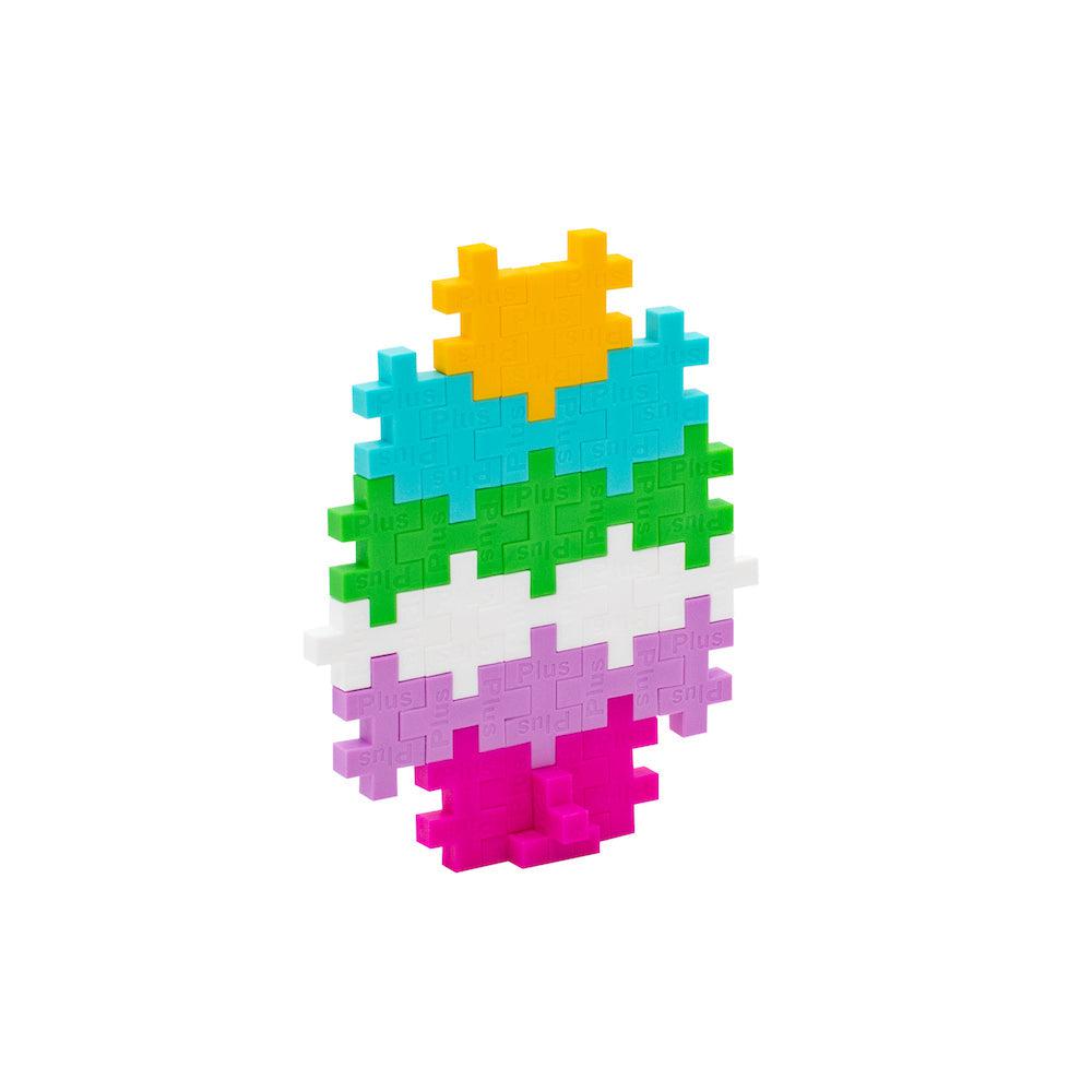 an Easter egg with several colors made from Plus plus blocks 