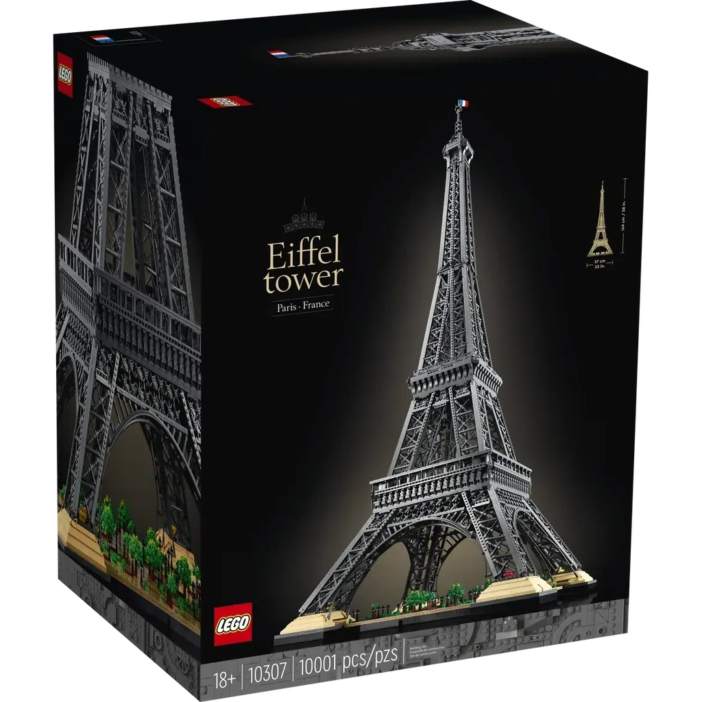 Front of the box shows the LEGO Eiffel Tower on a black background with a tan glow around the tower