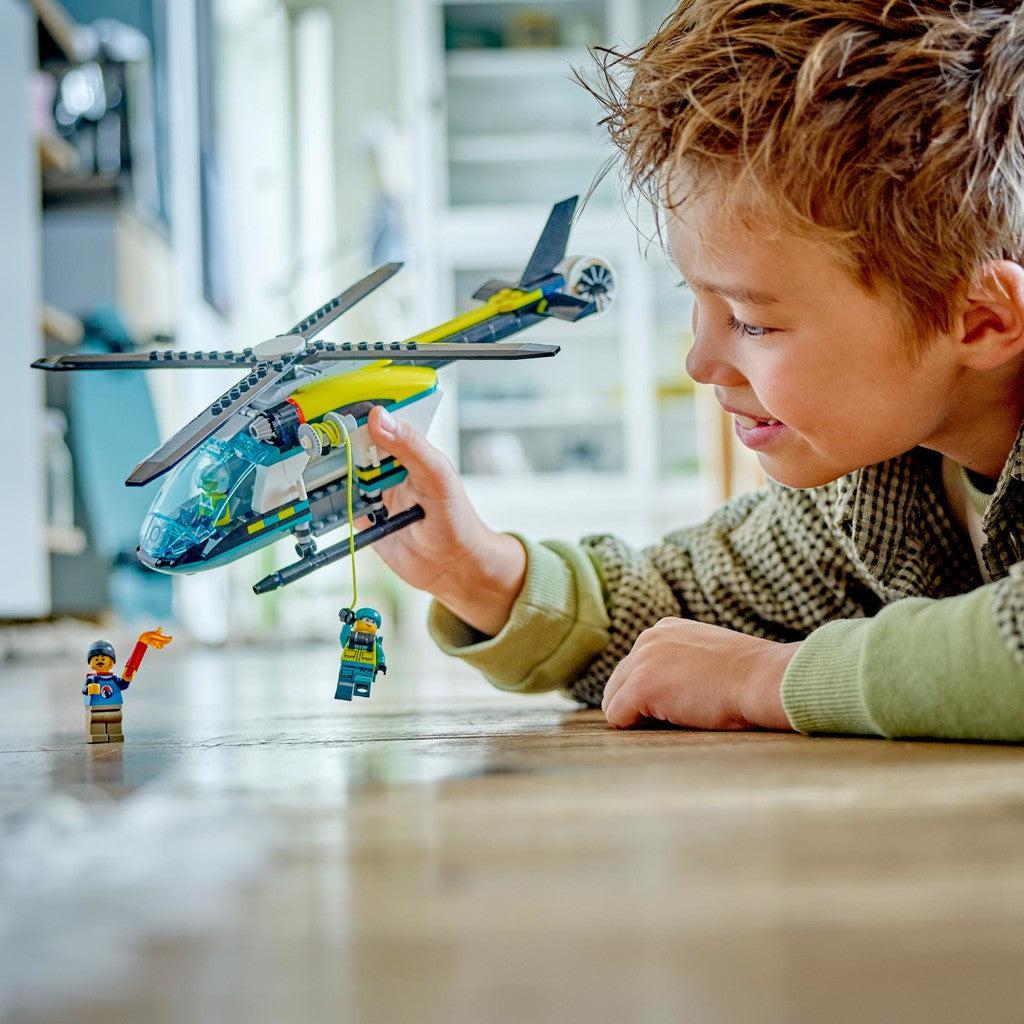fly the helicopter around and help out LEGO city