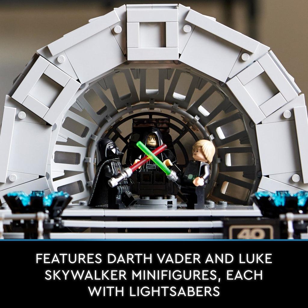 features darth vader and luke skywalker minifigures, each with lightsabers
