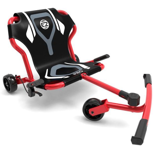 image shows the red pro x ezyroller at a front angle view of the roller. there is a seat with two hand grips and brakes for the back wheels with a leg bar in the front to wiggle the roller with the front wheel on a pivot. 
