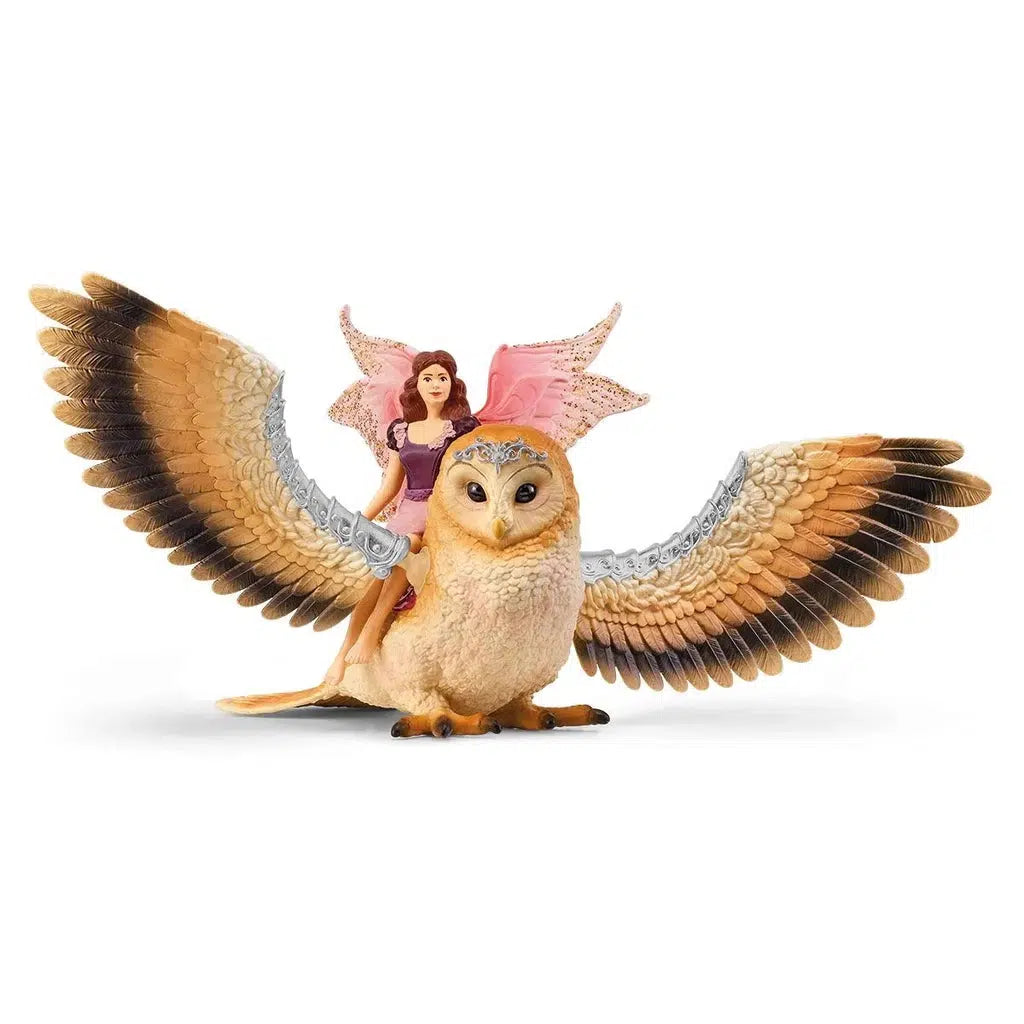 Image of the play set outside of the packaging. It comes with a large owl with a tiara and a fairy that can ride the owl.