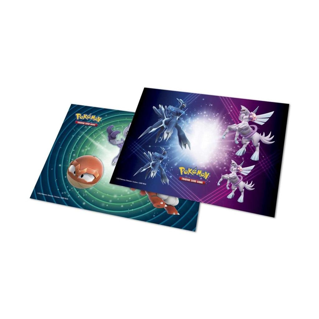 Close up of the included playing mats. One is blue and purple with pictures of two legendary pokemon on it and the other is green and blue with pictures of Voltorb, Sneasel, and Growlithe on it.
