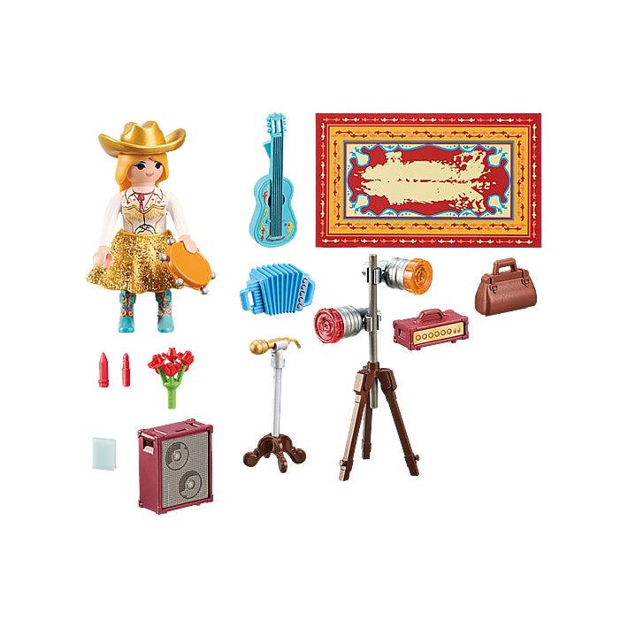 This image shows everything in the box, the country singer holding a tambourine, a guitar, accordion, rug, light system, sound sysyem, speakers, purse, golden microphone, and flowers