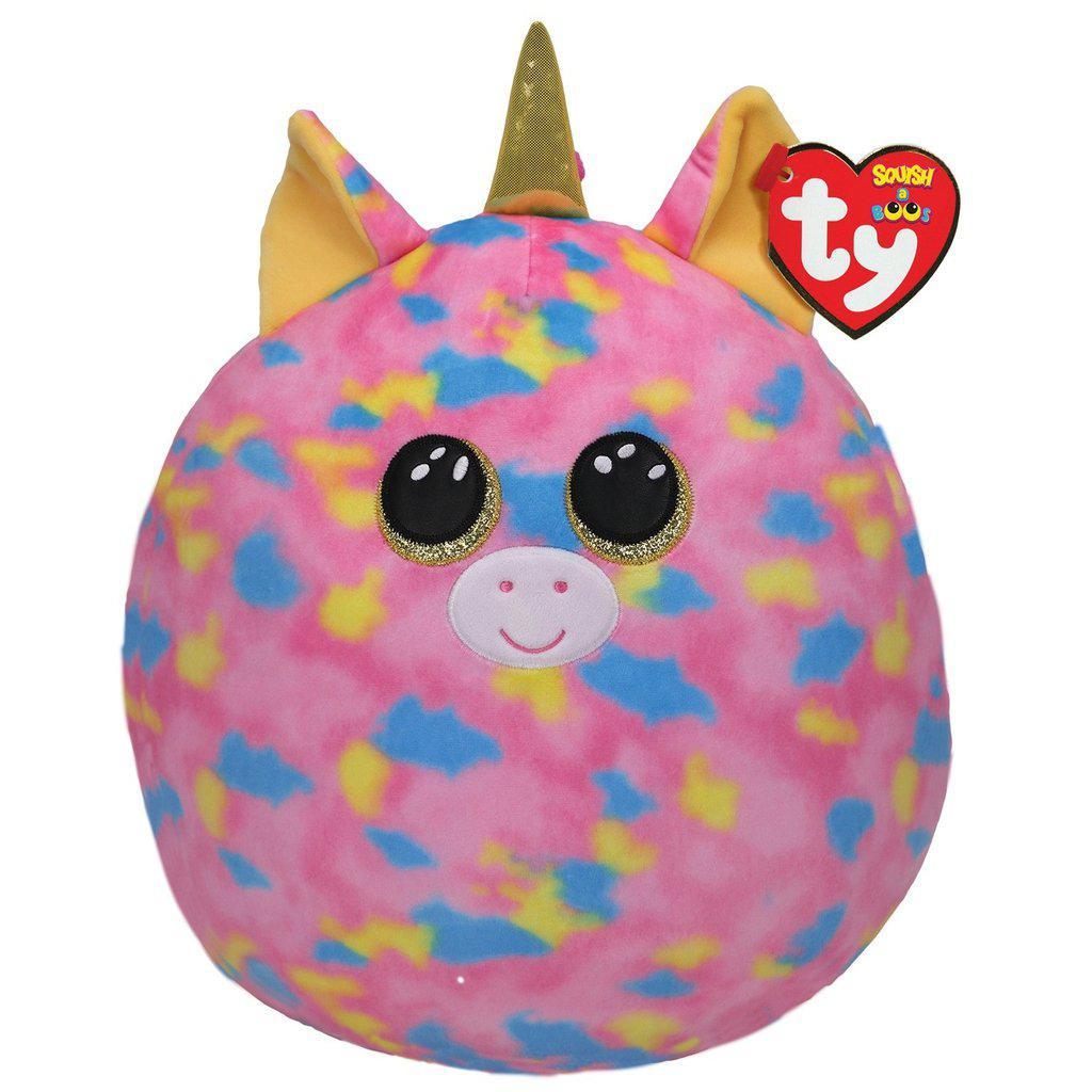 Image of the Fantasia Pink Unicorn Squish-A-Boo plush. It is a pink unicorn with blue and yellow spots. She has a glittery golden horn and eyes.
