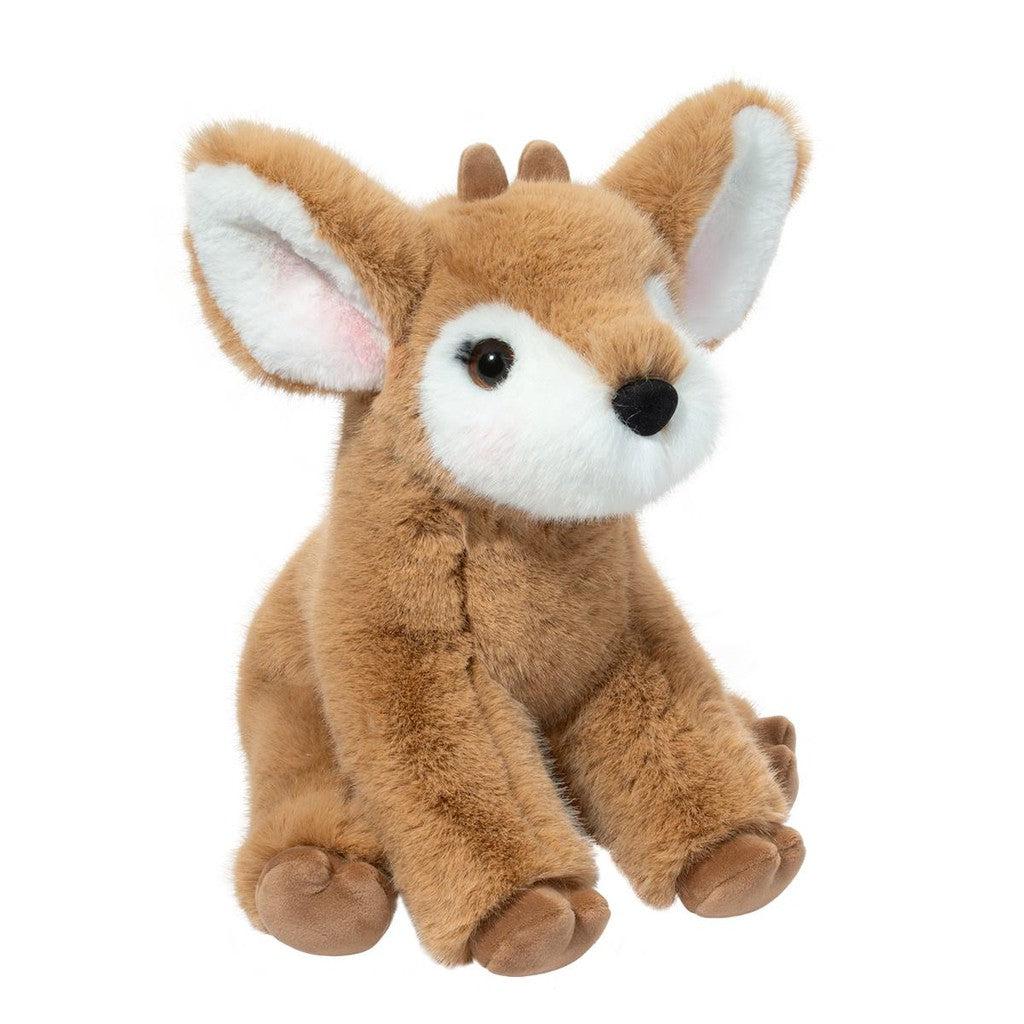 this image shows a baby fawn that is so fluffy. this is a very huggable friend. sporting brown fur and a button nose, 